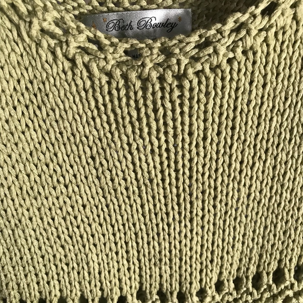 Beth Bowley green sleeveless knitted dress
